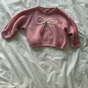Cozy Pink Knit Sweater with Bow Detail